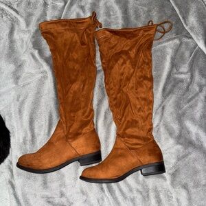 Over the knee flat boots